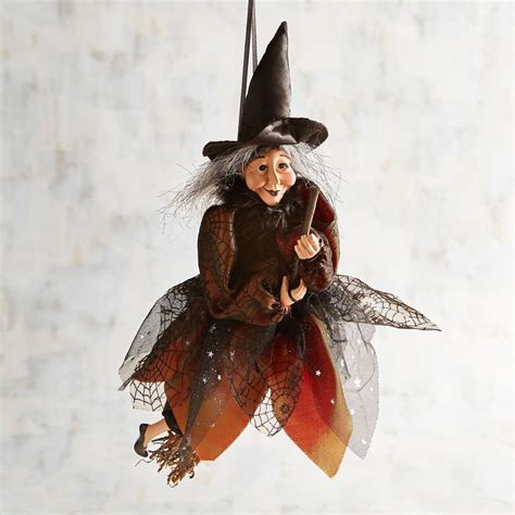 Witch on a flying broomstick ornament